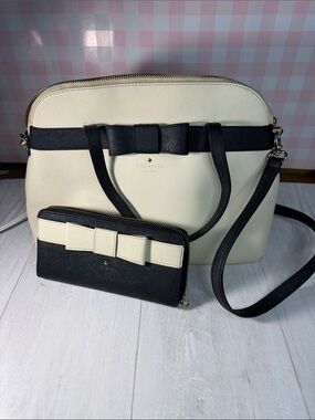 kate spade Cream and Black Bow Dome Satchel match with elegant wallet.